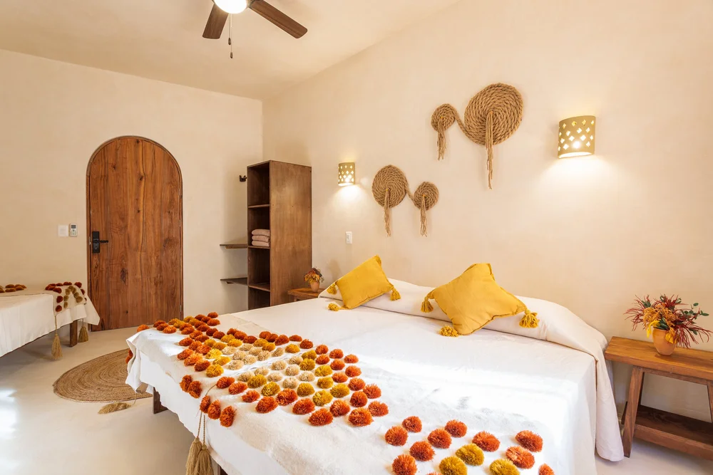 Real guest bedroom at DORA Jungle Retreat in Tulum, Mexico.